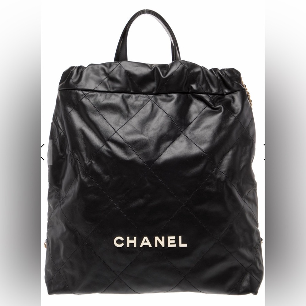 Chanel NWT 22 Backpack black with gold hardware and RARE white enamel logo